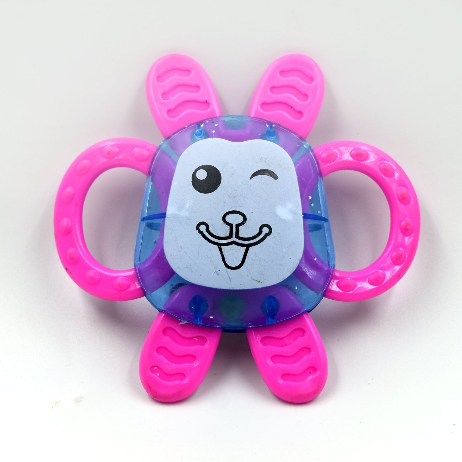 a set of three baby rattles featuring various colors and patterns. a set of three baby rattles featuring various colors and patterns.